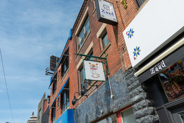 Obraz premium exterior building and sign of Zaad, a Mediterranean restaurant, located at 124 Danforth Avenue in Toronto, Canada