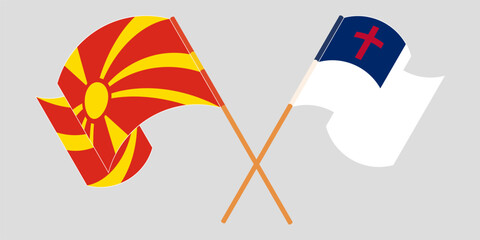 Crossed and waving flags of North Macedonia and christianity