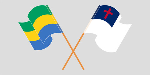 Crossed and waving flags of Gabon and christianity