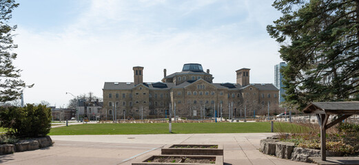 Fototapeta premium rear or north side of Bridgepoint Administration Building (The Old Don Jail) located at 550 Gerrard Street East in Toronto, Canada