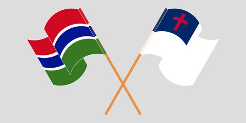 Crossed and waving flags of the Gambia and christianity
