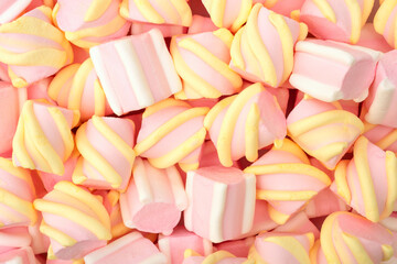 Pink and white marshmallows as background, top view. Dessert pastel colors, sweet food