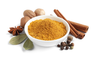 Dry curry powder in bowl surrounded by other spices isolated on white