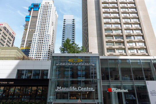 exterior facade and signs outside Manulife Centre, a shopping mall, located at 55 Bloor Street West in downtown Toronto, Canada (Bay Street entrance)