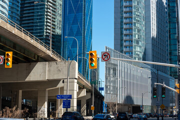 Fototapeta premium elevated road of Gardiner Expressway and new buildings at Harbour Street and Lake Shore Boulevard West in Toronto, Canada