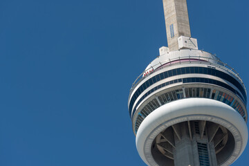 Fototapeta premium Edge Walk figures on the exterior of CN Tower in Toronto, Canada