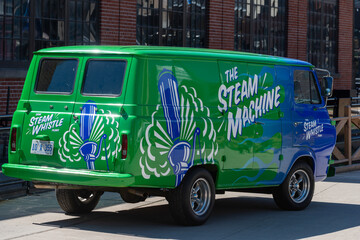 Fototapeta premium The Steam Machine promotional van parked outside Steam Whistle brewery located at Roundhouse Park at 255 Bremner Boulevard in downtown Toronto, Canada