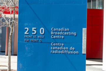 Fototapeta premium sign at the Canadian Broadcasting Centre (entrance at 250 Front Street West) in downtown Toronto