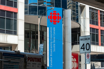 Fototapeta premium sign at the Canadian Broadcasting Centre (entrance at 250 Front Street West) in downtown Toronto - south facing