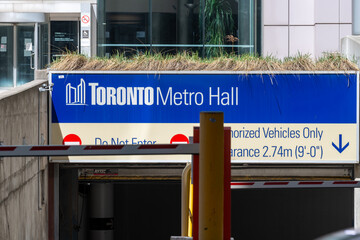 Fototapeta premium Toronto Metro Hall underground garage entrance and sign 