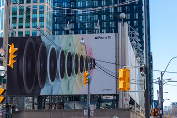 Fototapeta premium roadside billboard for Apple iPhone 15 in downtown Toronto, Canada