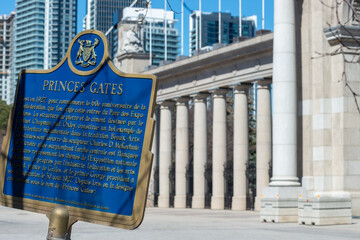 Fototapeta premium historical plaque near Princes' Gates, a historical landmark, located at 11 Princes' Boulevard eastern gateway of Exhibition Place in Toronto, Canada