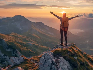 Foto op Plexiglas Solo Female Hiker Celebrates Conquering Mountain Peak at Sunset - Triumphant Traveler with Backpack Embracing Breathtaking Panoramic View © Magic_Cat