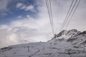 Ski lift at the top of Piz Nair mountain, near St Moritz, Switzerland