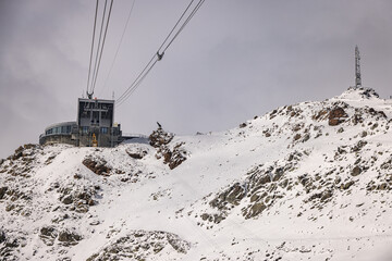 Ski lift at the top of Piz Nair mountain, near St Moritz, Switzerland
