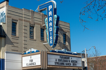 Fototapeta premium projecting marquee sign Paradise Theatre (1006 Bloor Street West in Toronto, Canada) a heritage movie theatre and entertainment venue first opened in 1937 designed by Benjamin Brown in Art Deco style
