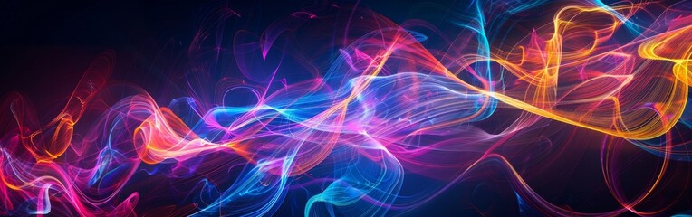 Fototapeta premium Various colorful lights are scattered throughout the photo, creating a blurry effect against a black background. The lights appear to be in motion, creating a dynamic and vibrant visual display.