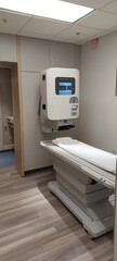 A tidy health screening area with digital body scanning equipment, featuring a neutral backdrop for preventive healthcare themes
