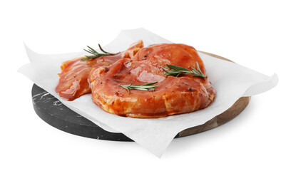 Board with raw marinated meat and rosemary isolated on white