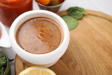 Fresh homemade marinade in bowl on table, closeup