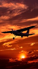 A plane can be seen flying in the sky during sunset, the colors of dusk casting a warm glow on the aircraft as it soars through the clouds.