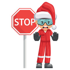 Annoyed industrial mechanic worker with Santa Claus hat stop sign. Engineer with his personal protective equipment. Merry christmas. Industrial safety and occupational health at work