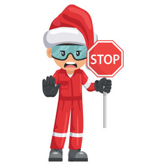 Annoyed industrial mechanic worker with Santa Claus hat with stop sign. Engineer with his personal protective equipment. Merry christmas. Industrial safety and occupational health at work