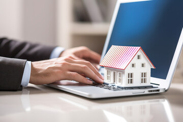 Fototapeta premium Man looking for house on real estate market website. Online mortgage and home loan concept