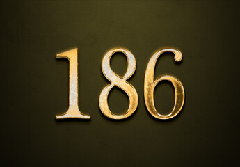 Old gold effect of 186 number with 3D glossy style Mockup.	