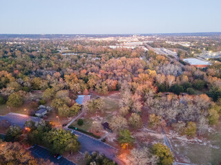Aerial landscape of forest and pond at sunset in Augusta Georgia