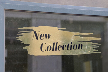 Gold Sign Text New Collection Foil Sticker at Shop Window