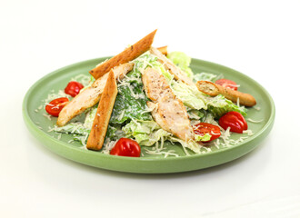 Chicken Salad. Chicken Caesar Salad. Caesar Salad with grilled chicken and croutons. Grilled chicken breast and fresh green salad isolated on white
