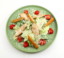 Chicken Salad. Chicken Caesar Salad. Caesar Salad with grilled chicken and croutons. Grilled chicken breast and fresh green salad isolated on white