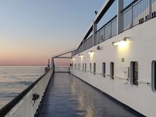 A ferry outer deck at dusk