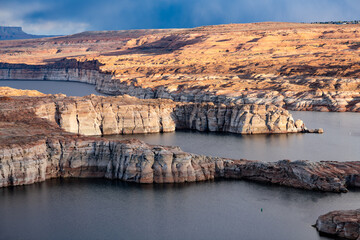 Lake Powell is a huge artificial reservoir of Colorado River with “Glen Canyon Dam” dam near...
