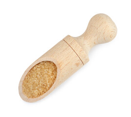 Brown sugar in scoop isolated on white, top view