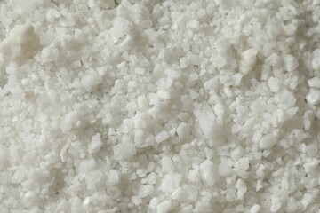Organic sea salt as background, top view