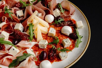 Charcuterie Board with Prosciutto, Salami, Cheese, and Olives, Perfect for Entertaining