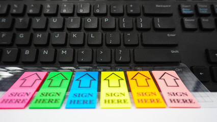 Close up computer keyboard with signature sign marker in office or workspace.  a working tool...