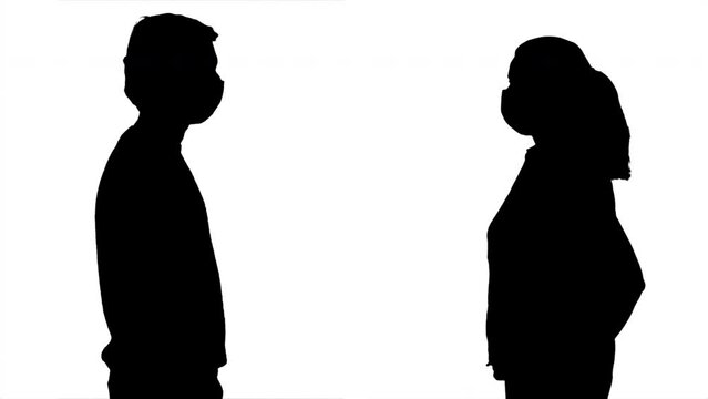 Silhouette Couple Profile Wearing Face Mask Protection Medium Shot. Silhouettes of a man and a woman wearing a face mask protection. Medium shot