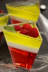 jelly dessert in a glass with fresh berries