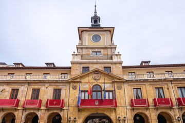 Old town hall , A large historic building in Oviedo, Spain, featuring a prominent clock tower on...