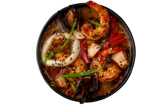Tom Yum soup with tomato and seafood