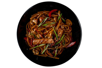 Asian wok noodles with with meat and vegetables with chopsticks on the table.