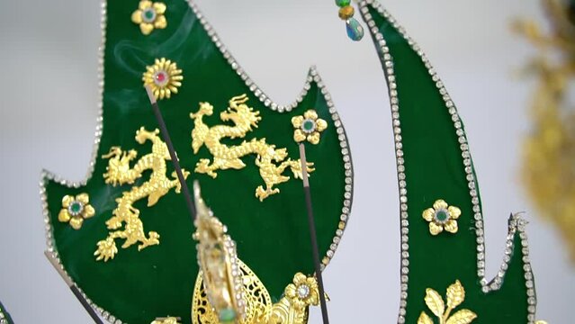 Traditional green flags with golden dragon motifs and decorative borders, symbolizing Asian culture and festivities.