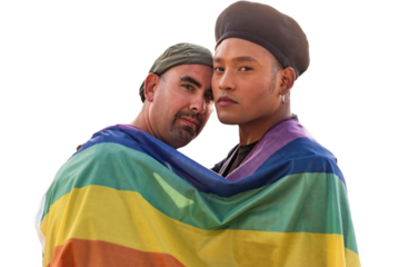 Gay couple under LGBT rainbow flag while looking at camera on transparent background