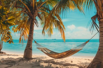 Tropical island getaway. relaxing in a hammock under a palm tree with stunning sea views