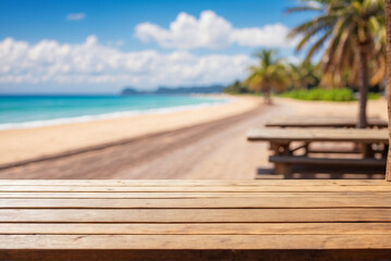 Fototapeta premium Empty Wooden Table With Blur Beach And Sea On background. Sunny tropical exotic Caribbean paradise beach