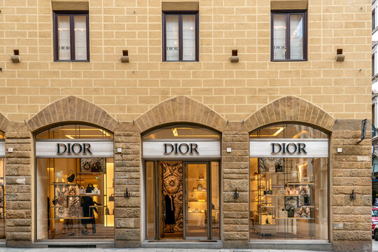 Florence, Italy - April 04, 2024: Dior clothing boutique in Via Strozzi, exterior view store entrance and windows