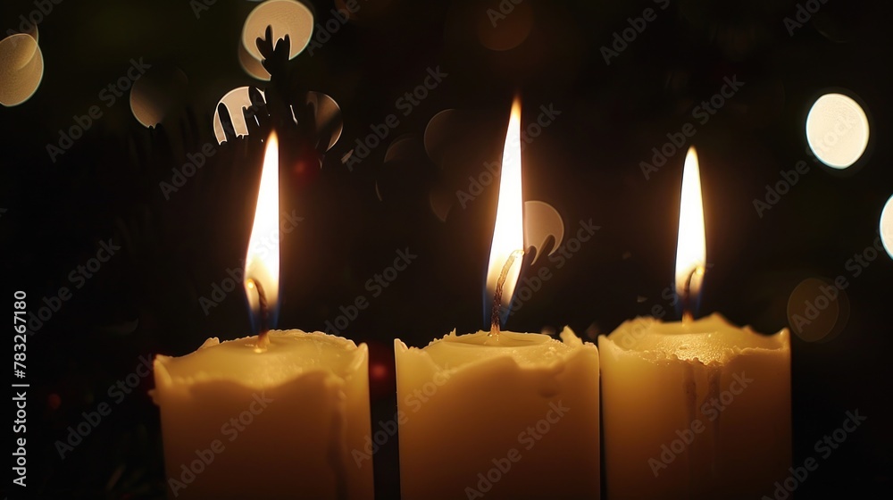 Poster Three candles burning in a row on a table, suitable for various concepts and designs